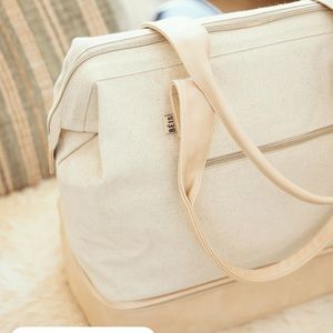 The convertible mini weekender, brand new.